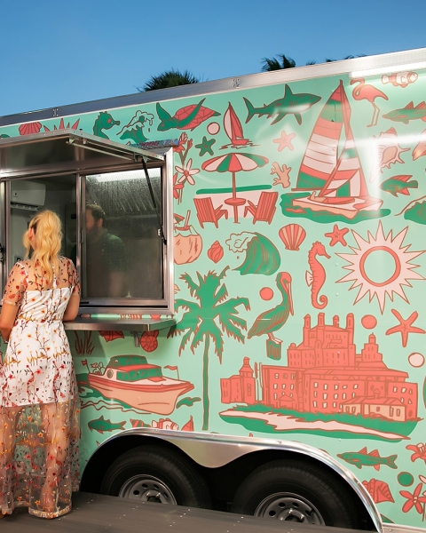 a couple waiting at a food truck